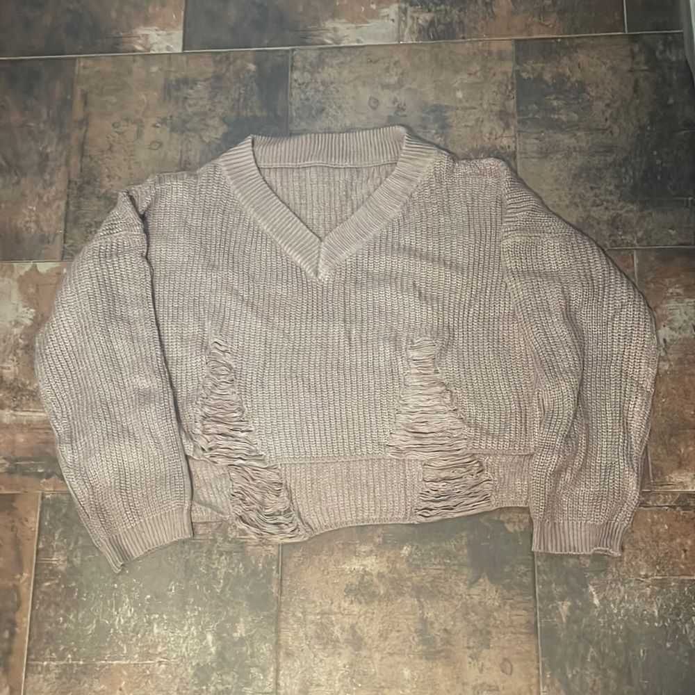 Ripped sweater
